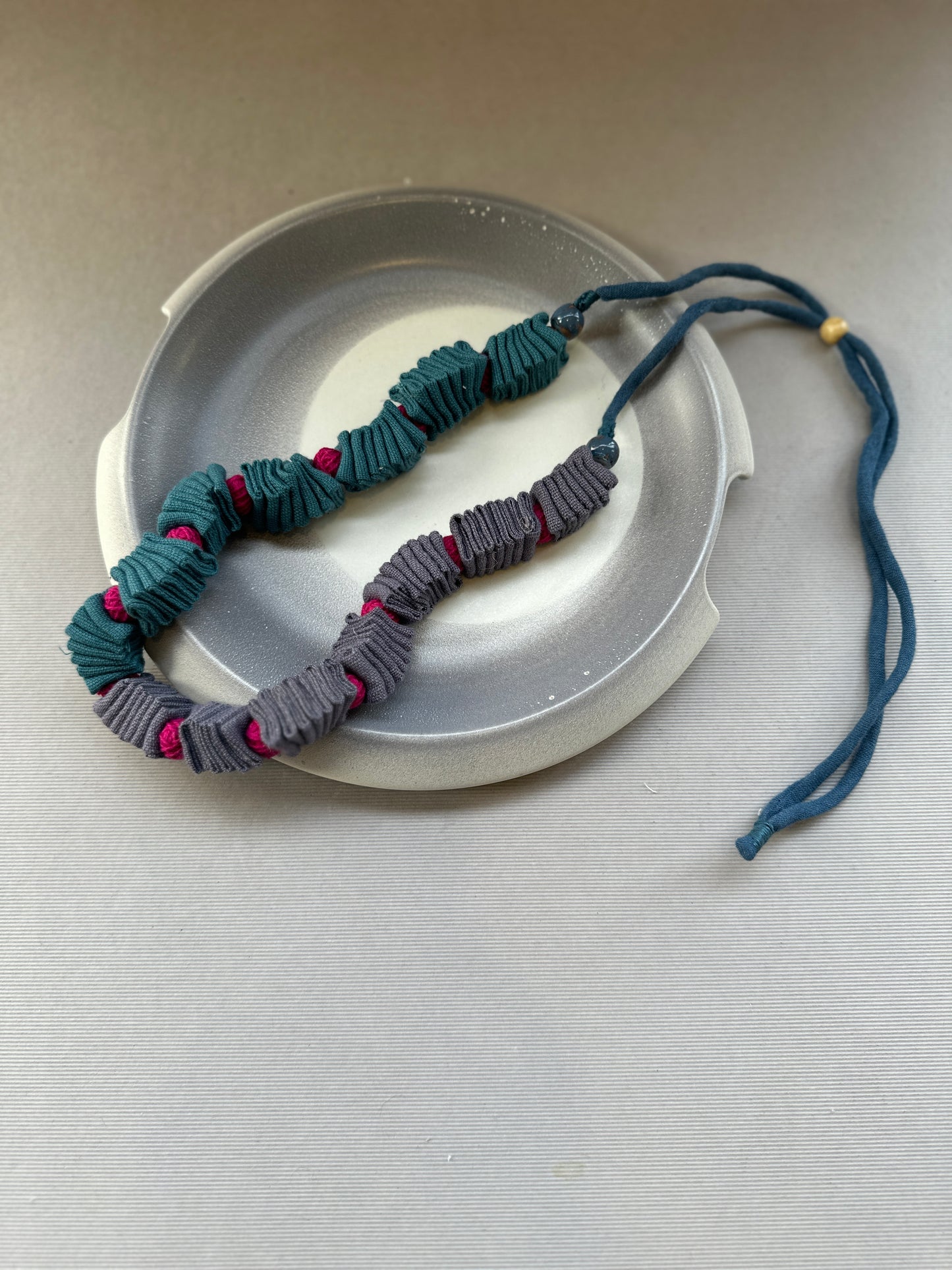 fabric criss cross neckpiece