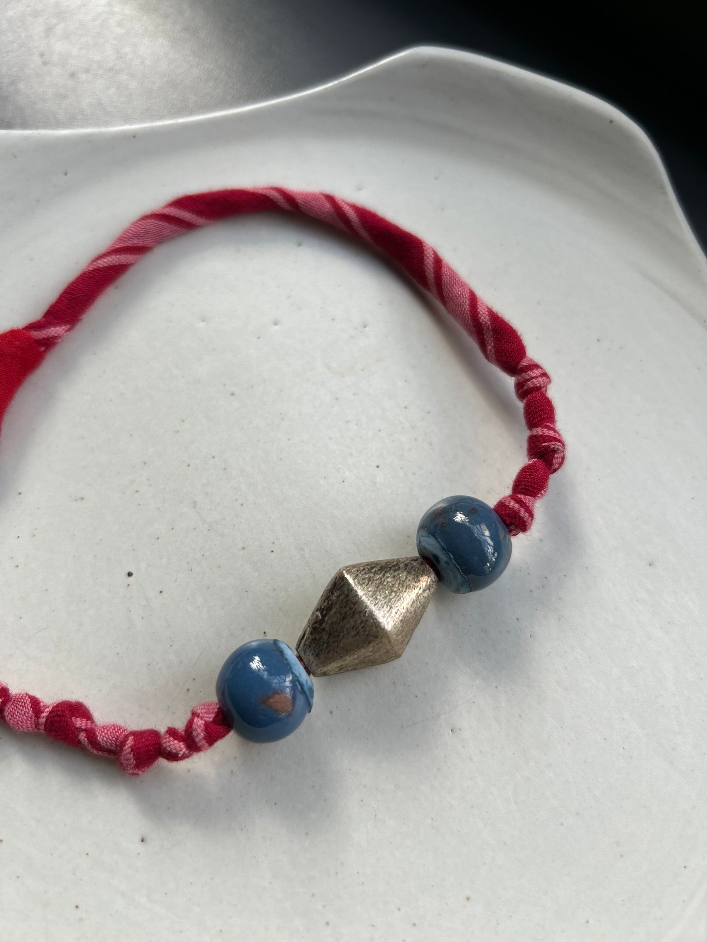 red fluff bracelet