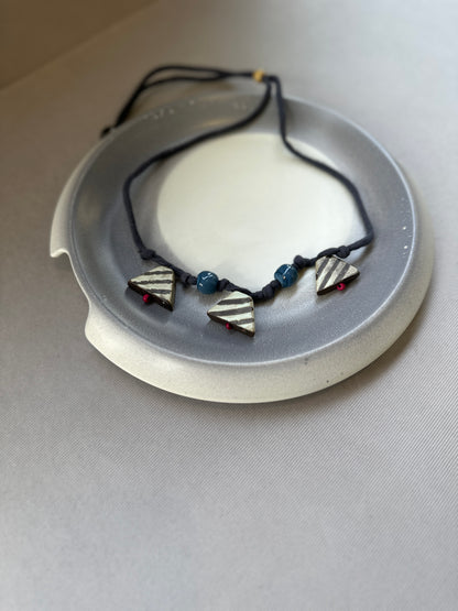 cera fabric tribhuj neckpiece