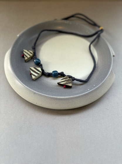 cera fabric tribhuj neckpiece