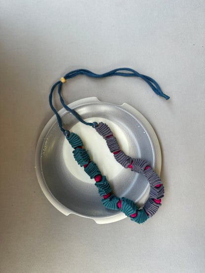 fabric criss cross neckpiece