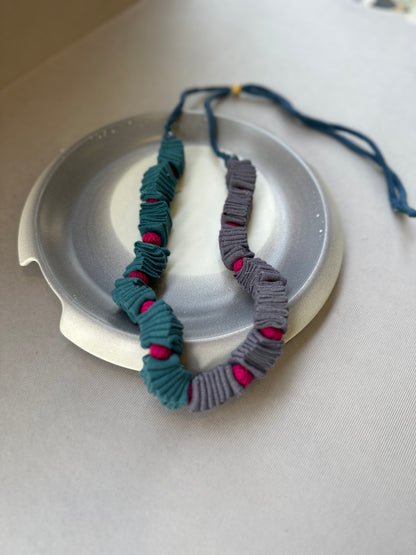 fabric criss cross neckpiece