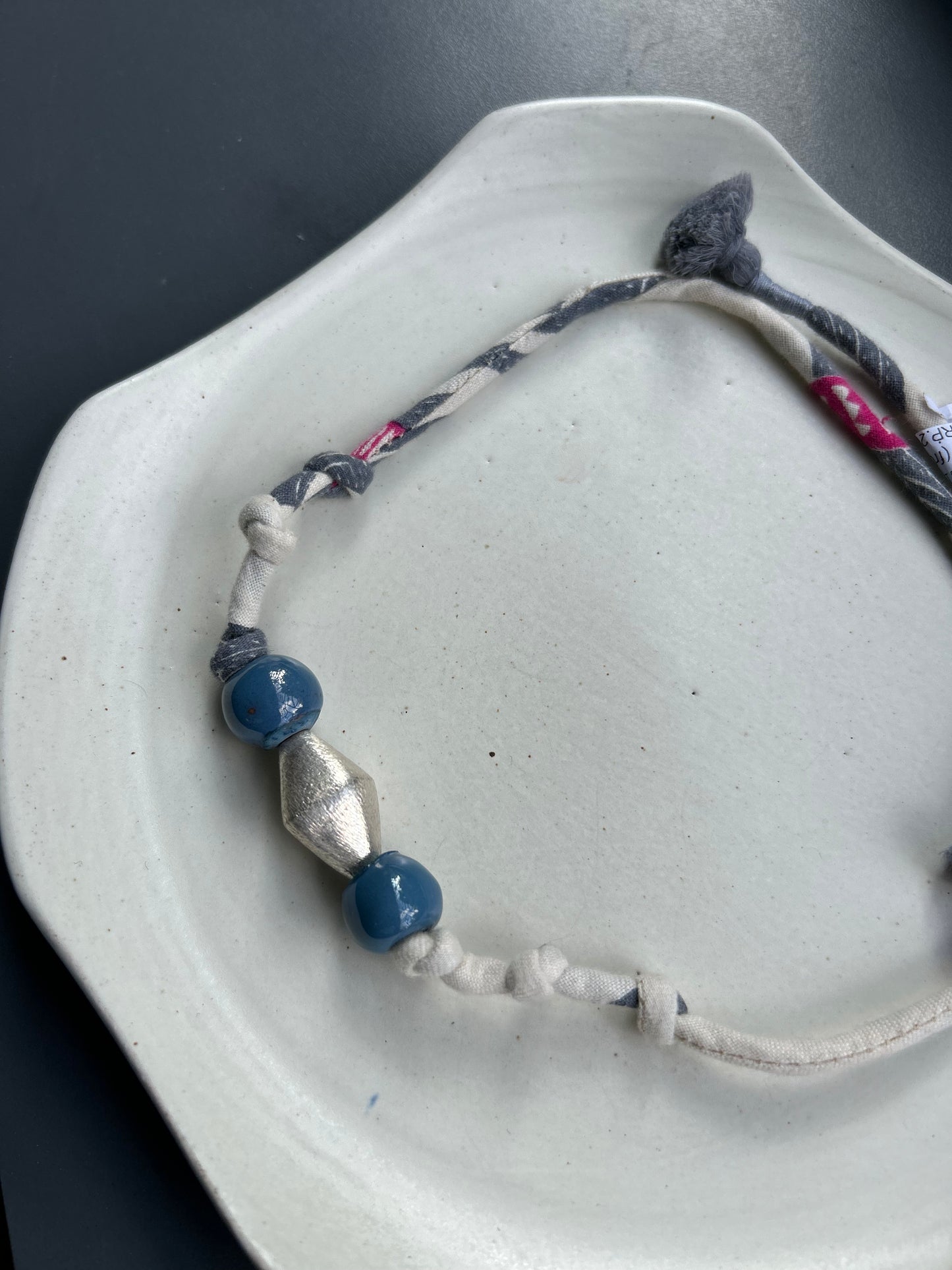 grey fluff bracelet